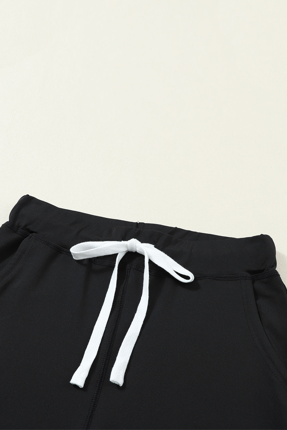 DRAWSTRING WAIST POCKETED JOGGERS