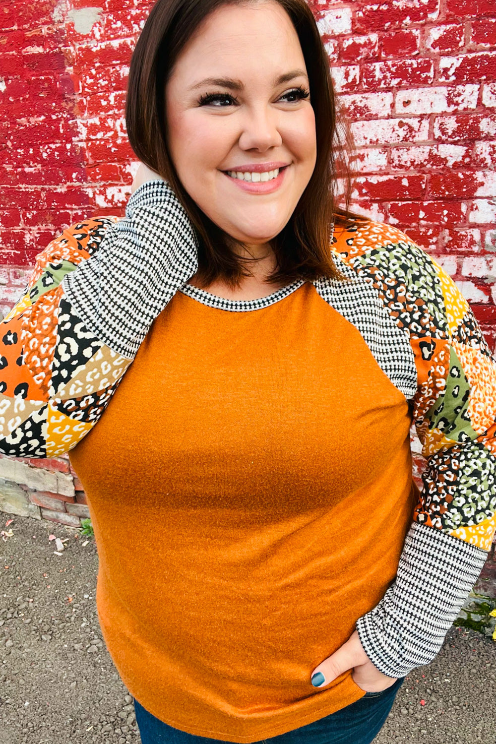 Feeling Myself Rust & Black Animal Print Two Tone Raglan Top